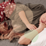 Why Does My Dog Sleep Pressed Against Me?